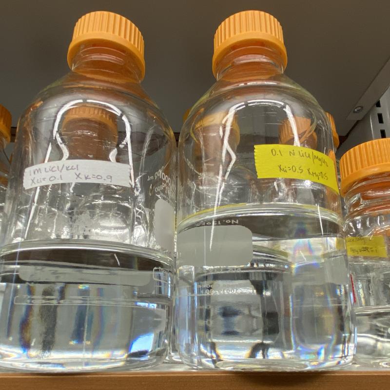 Image of bottles with orange tops